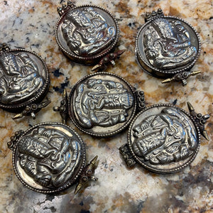 Gau Pendants