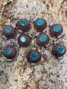 Gau Pendants