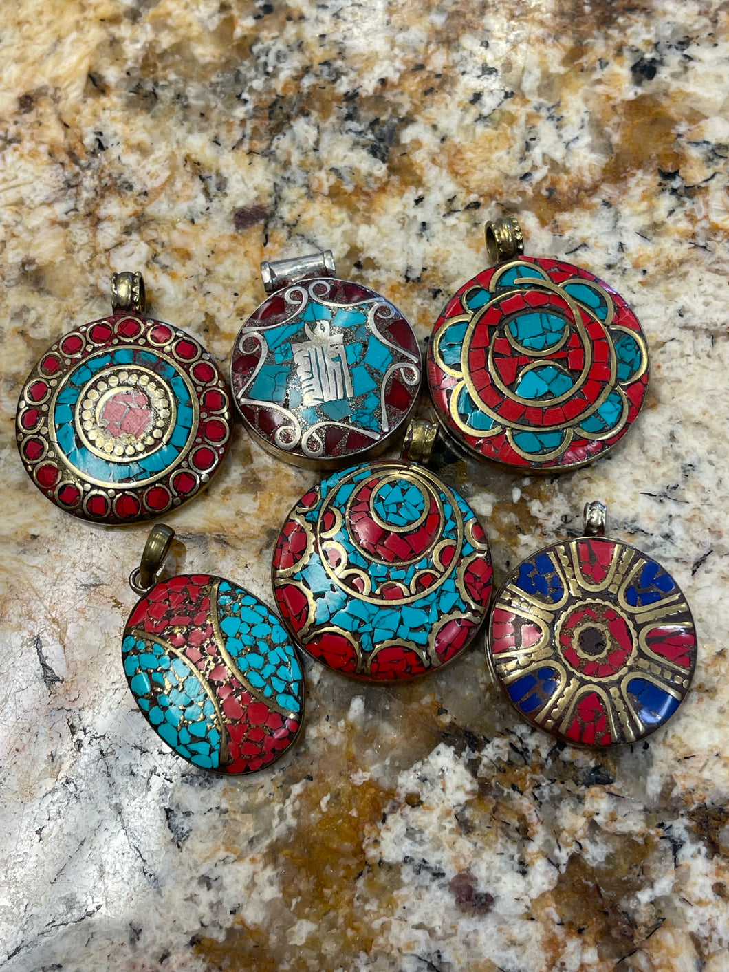 Brass and stone pendants
